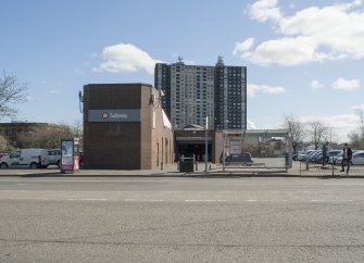 View from west looking across Bridge Street to the subway station, with the Norfolk Court high-rise flats beyond.