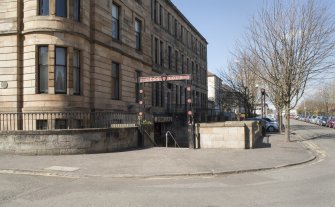 View from south, looking to the stantions and boundary walls marking the stairs down to the Cessnock subway station entrance concourse.