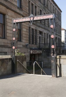 Detail of stairhead stantion with entrance portal beyond, at Cessnock subway station