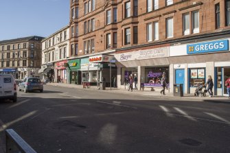 View from south, looking along Dumbarton Road to the projecting entrance canopy of Kelvinhall subway station