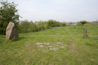 View looking west from the centre of the Sighthill Stone Circle, with the remains of the cobbled ground treatment visible in the foreground