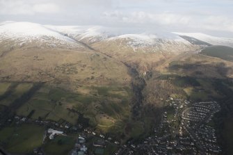 General oblique aerial view of the Glen of Sorrow and Tarmangie Hill with Dollar in the foreground, looking N.