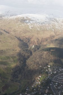 General oblique aerial view of the Glen of Sorrow and Tarmangie Hill with Dollar in the foreground, looking NNW.