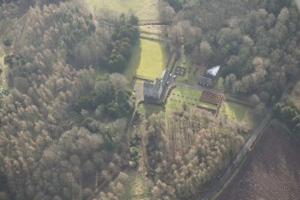 Oblique aerial view of Cleish Castle and gardens, looking SW.