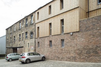 View  of converted brewery buildings in Sugarhouse Close, 160 Canongate, Edinburgh, from NE.