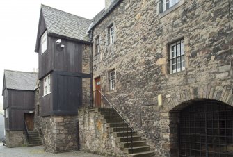 General view of timber jettied houses in Bakehouse Close, 146 Canongate, Edinburgh, from N.