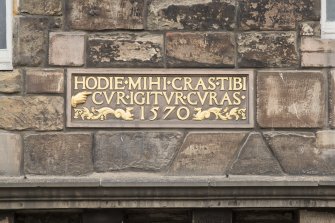 Detail of plaque on front elevation of Huntly House Museum, 142-146 Canongate, Edinburgh.