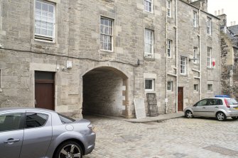 View of arched pend leading from Canongate to Sugarhouse Close, Edinburgh, from SW.