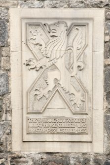 Detail of armorial panel above St John's Close, at 176-182 Canongate, Edinburgh, on Canongate elevation.