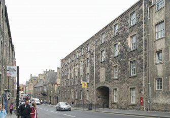 General view of 176-182 Canongate, Edinburgh, from NW, showing arched pend to St John Street.
