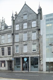 View of tenement building with Brewdog Bar in ground floor unit, taken from north east