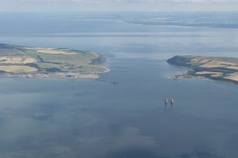 General oblique aerial view of the Cromarty Firth with the Nigg Oil Platform Fabrication Yard to the left and Cromarty to the right, with the Moray Plain in the distance, looking to the ESE.