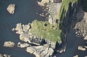 Oblique aerial view of Bucholly Castle, looking SW.