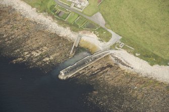 Oblique aerial view of Skirza Harbour, looking NW.