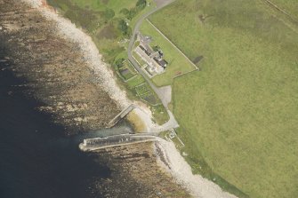 Oblique aerial view of Skirza Harbour, looking WSW.