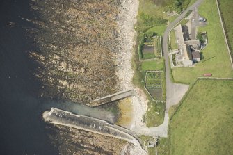 Oblique aerial view of Skirza Harbour, looking W.