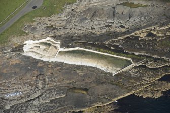 Oblique aerial view of Trinkie Bathing Pool, looking NNE.