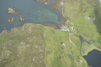 Oblique aerial view of Port of Tarbet, looking WNW.