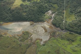 Oblique aerial view of the possible fish trap in Lochan na Laobaig, looking E.