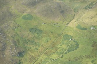 Oblique aerial view of Achnacarnin Township, looking E.