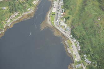 Oblique aerial view of Lochinver and fish trap, looking NE.