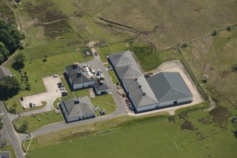 Oblique aerial view of the Isle of Arran Distillery, looking to the SE.