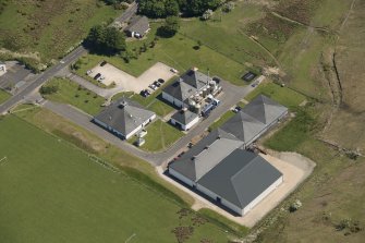 Oblique aerial view of the Isle of Arran Distillery, looking to the E.