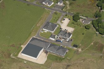 Oblique aerial view of the Isle of Arran Distillery, looking to the ENE.