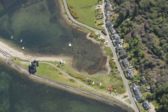 Oblique aerial view of Lochranza Castle and fish trap, looking to the ESE.