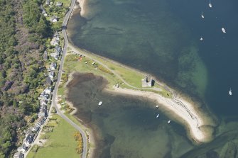 Oblique aerial view of Lochranza Castle and fish trap, looking to the NW.