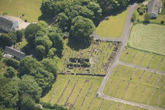 Oblique aerial view of Kilbride Chapel and churchyard, looking to the S.