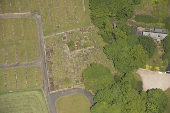 Oblique aerial view of Kilbride Chapel and churchyard, looking to the N.