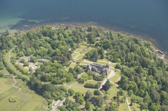 Oblique aerial view of Brodick Castle and walled garden, looking to the SE.