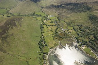 General oblique aerial view of Lochranza centred on Lochranza Golf Course, looking to the ESE.