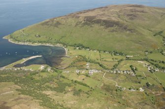 General oblique aerial view of Lochranza centred on Lochranza Golf Course, looking to the NNE.