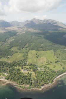 General oblique aerial view of Brodick Castle Estate centred on the castle, looking to the NW.