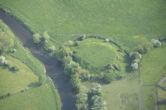 Dumfries And Galloway, Buittle Castle. Oblique aerial view of motte, looking to the S.