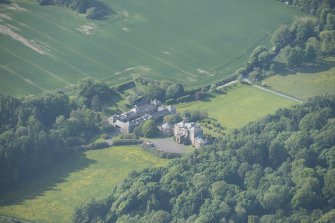 Oblique aerial view of Arbigland House and stable block, looking to the N.