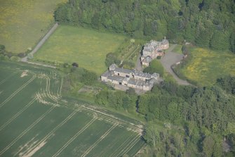 Oblique aerial view of Arbigland House and stable block, looking to the E.