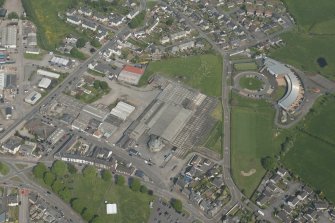 Oblique aerial view of Castle Douglas Cattle Market, looking to the E.