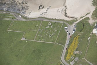 Oblique aerial view of Balnakeil Parish Church and Churchyard, looking to the N.