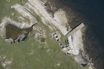 Oblique aerial view of Ard Neackie Limekilns and Quarry, looking to the E.