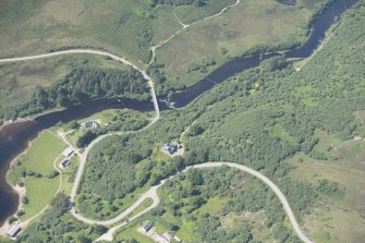 Oblique aerial view of Hope Bridge, Hope Lodge and the weirs, looking to the NW.