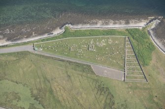 Oblique aerial view of Achuvoldrach Cemetery, looking to the SE.