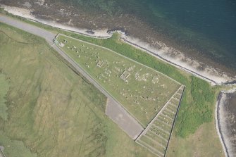 Oblique aerial view of Achuvoldrach Cemetery, looking to the E.