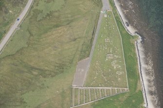 Oblique aerial view of Achuvoldrach Cemetery, looking to the NNE.