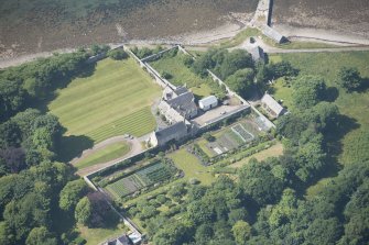 Oblique aerial view of Tongue House and walled garden, looking to the NW.