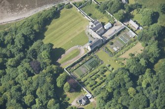 Oblique aerial view of Tongue House and walled garden, looking to the NW.