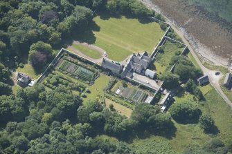 Oblique aerial view of Tongue House and walled garden, looking to the W.