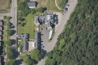 Oblique aerial view of Tongue Hotel, looking to the N.